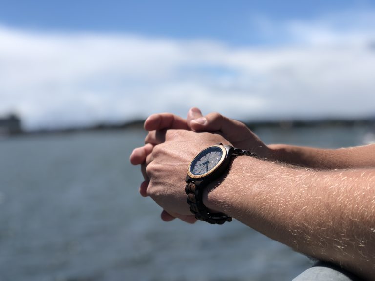 Forever Fresh wood watch beside ocean