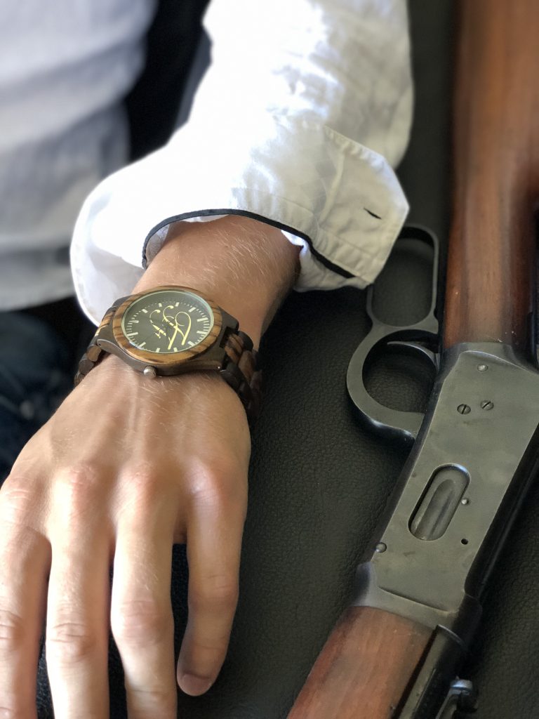 wood watch with winchester rifle