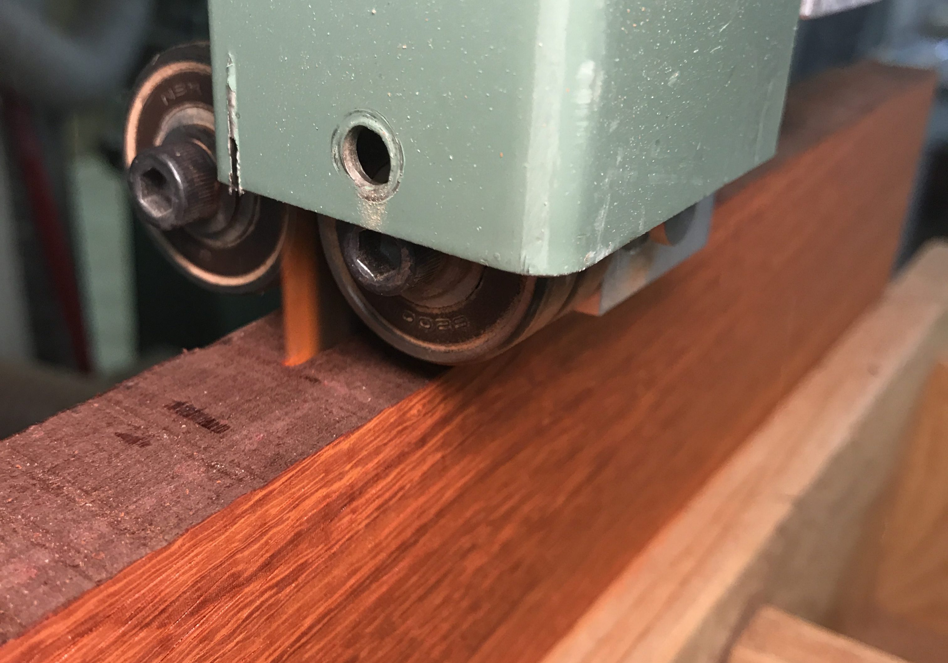 band-saw-re-sawing-lumber-red-padauk